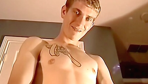 Amateur brunette with a tattooed pussy enjoys solo time