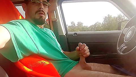 Car with a beautiful brunette masturbates on a car