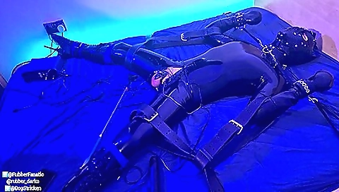 Latex bondage and hardcore bdsm session with a gimp