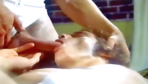 Busty brunette gives a deepthroat and facial to a handsome guy