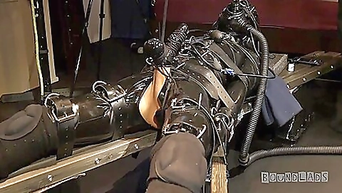 Bondage video featuring a kinky woman with a strapon
