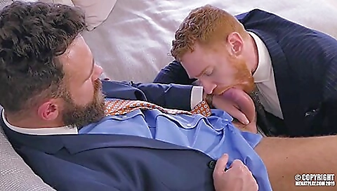 Big ass redhead with a tattooed body enjoys deep throat
